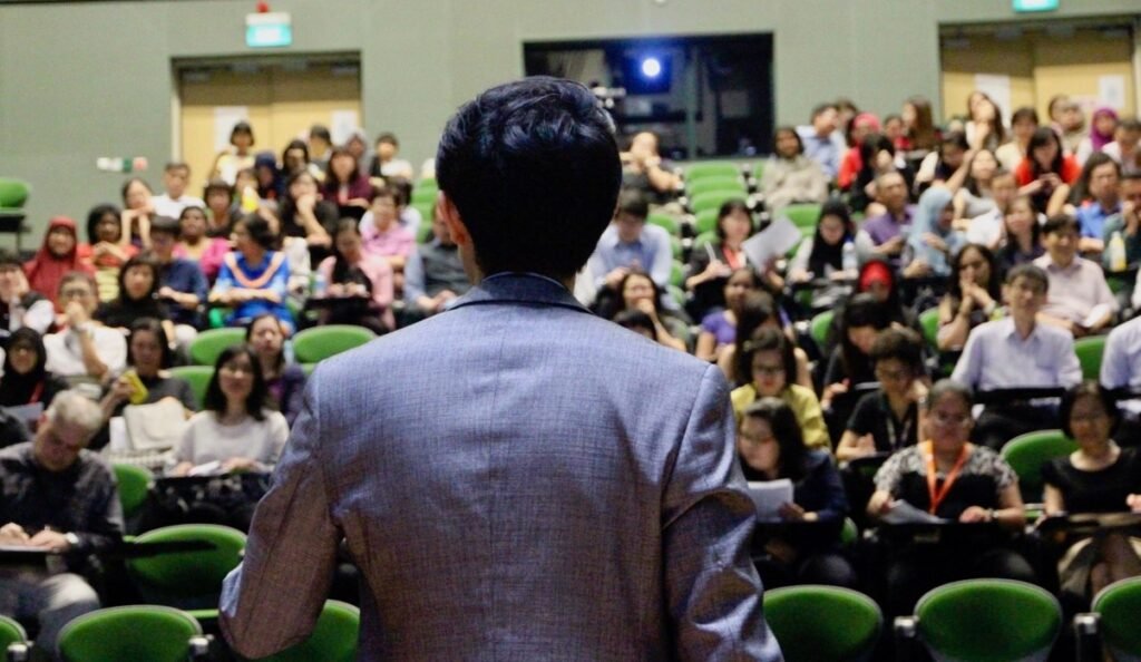 Kenneth Kwan speaking on Rise Above